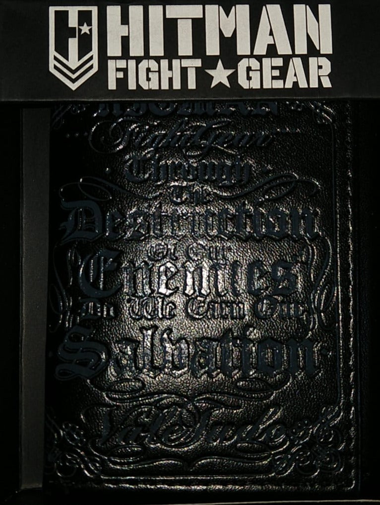 Close-up of the gothic script embossing on the black wallet