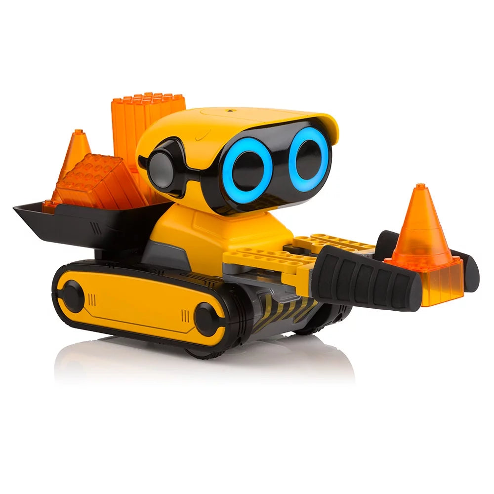 Yellow tracked robot with glowing blue eyes, grabber arm and a bucket of orange blocks
