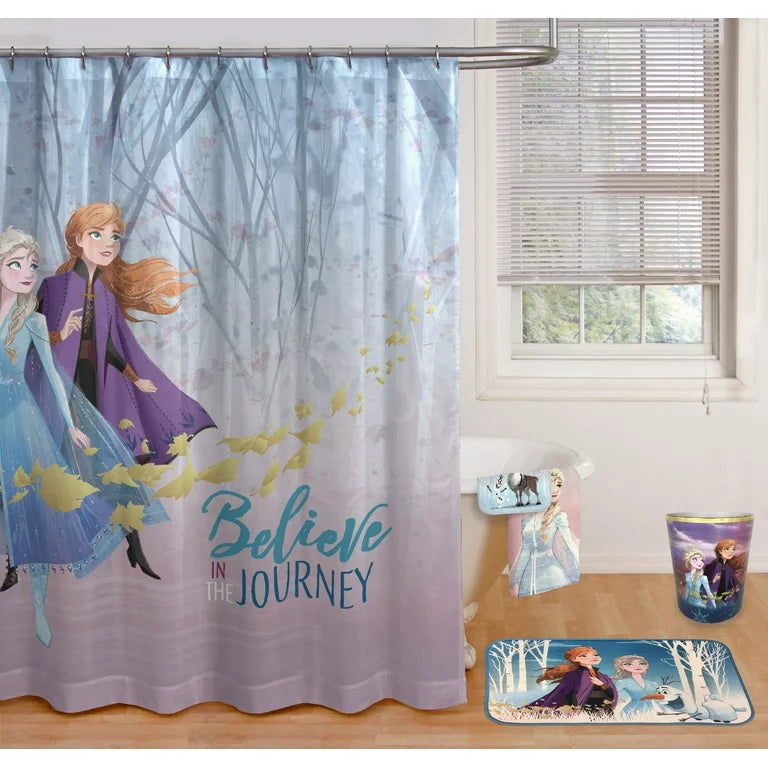 Bathroom with a Frozen 2 shower curtain, towel, wastebasket and the foam rug