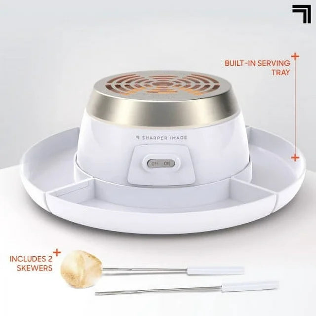 Empty s'mores maker showing its built-in serving tray and two skewers