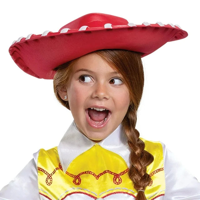 Close-up of a girl in the red stitched cowgirl hat and yellow yoke shirt