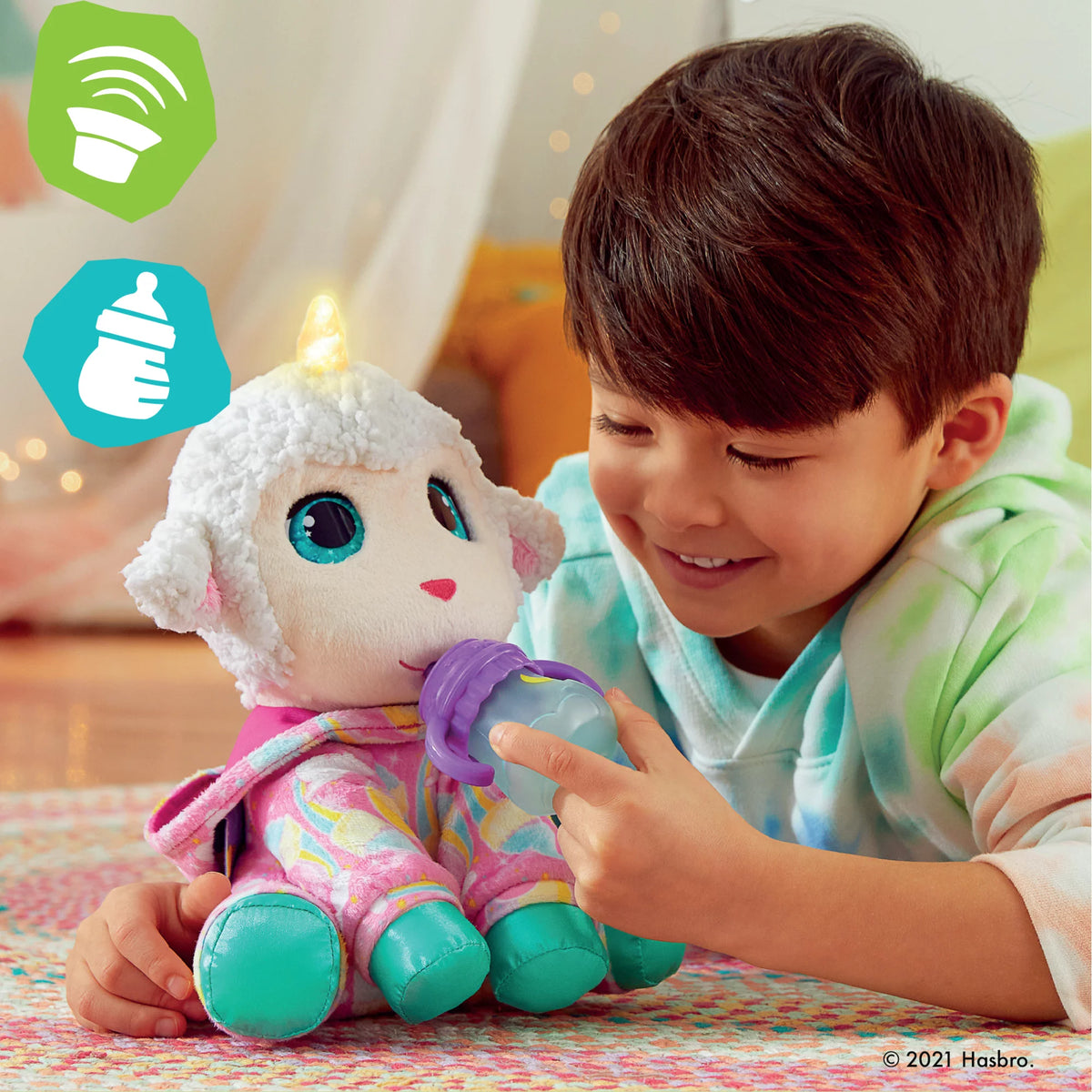 Boy feeding the lamb plush its bottle while the horn glows
