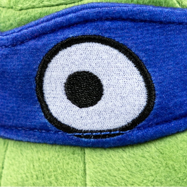 Close-up of the embroidered eye on Leo's blue mask