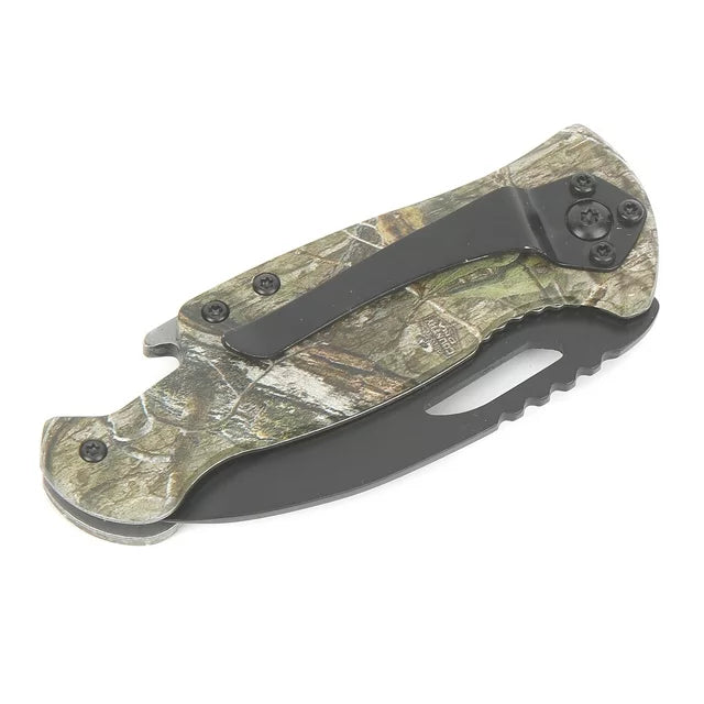 Closed camo knife from the clip side with the serrated blade spine showing