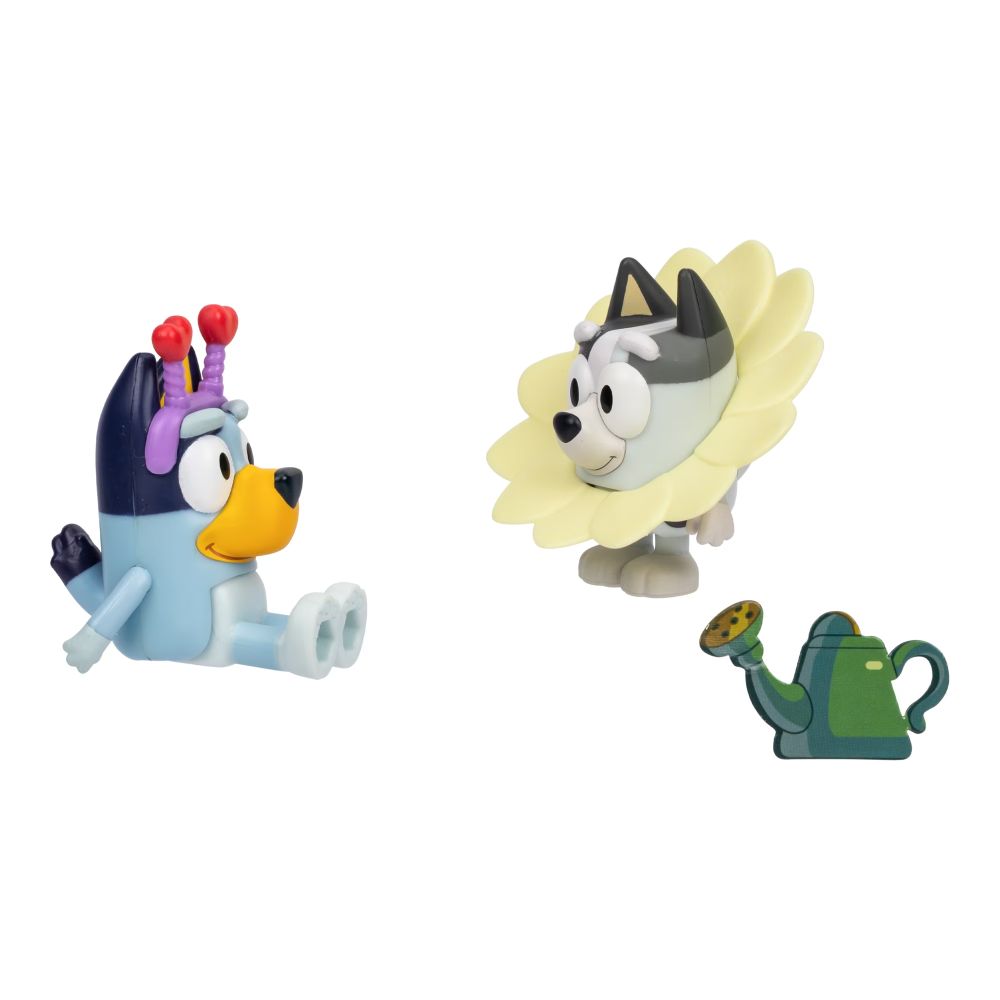 Bluey figure sitting beside Muffin wearing the flower collar, with the watering can