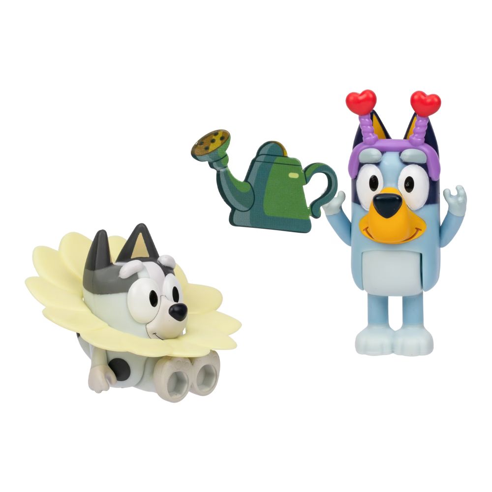 Muffin in the flower collar and Bluey standing with arms up next to the watering can