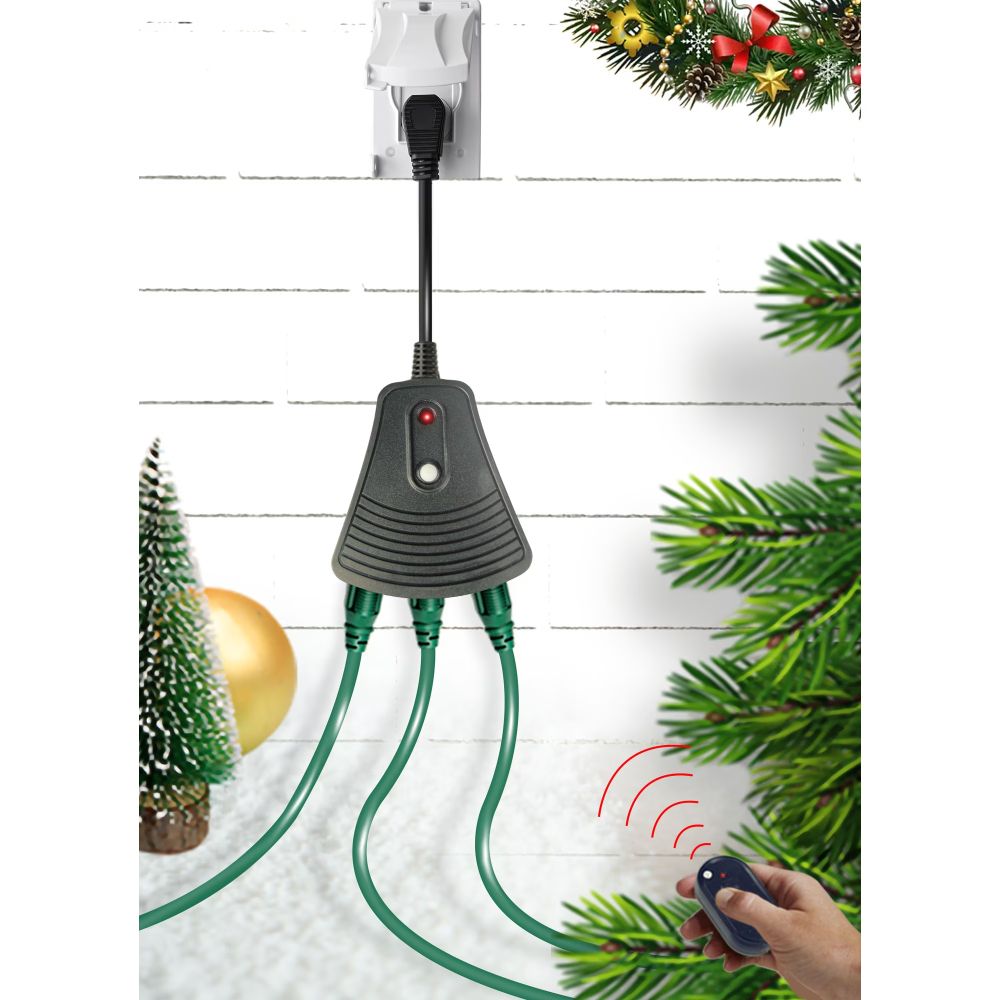 Hyper Tough 3-outlet receiver plugged into a wall running three green holiday light cords, remote in hand