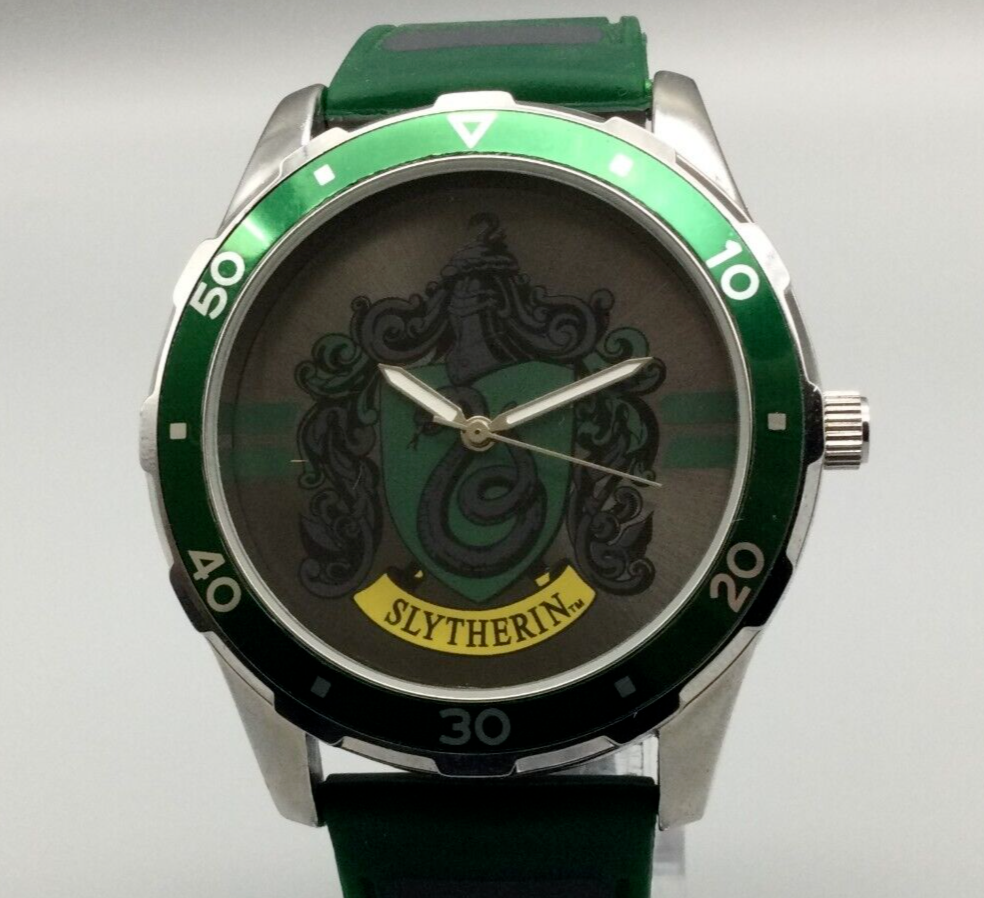 Silver-tone watch with green bezel, green strap and the Slytherin crest on a grey dial