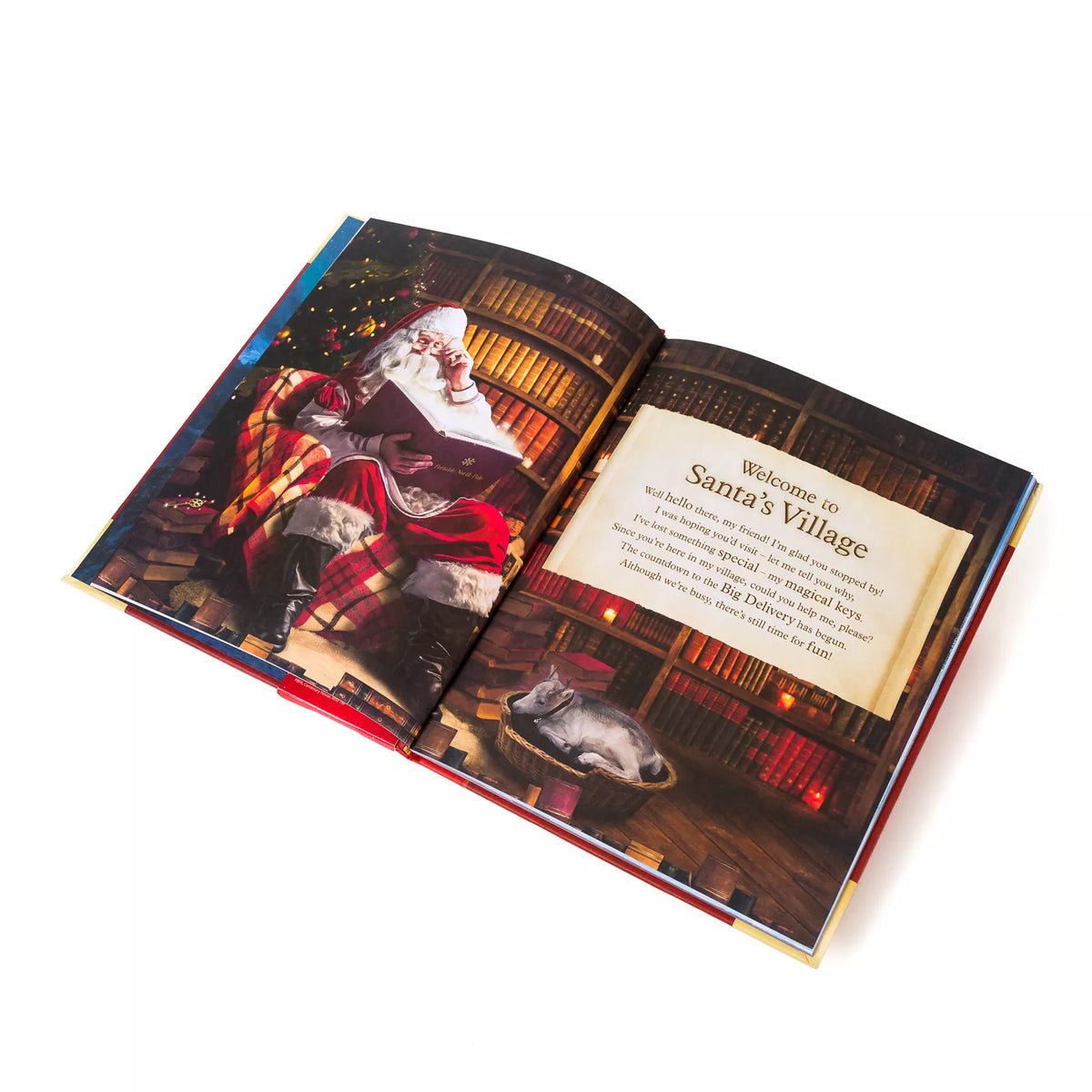 Open storybook: Santa reading in a library beside a Welcome to Santa's Village page