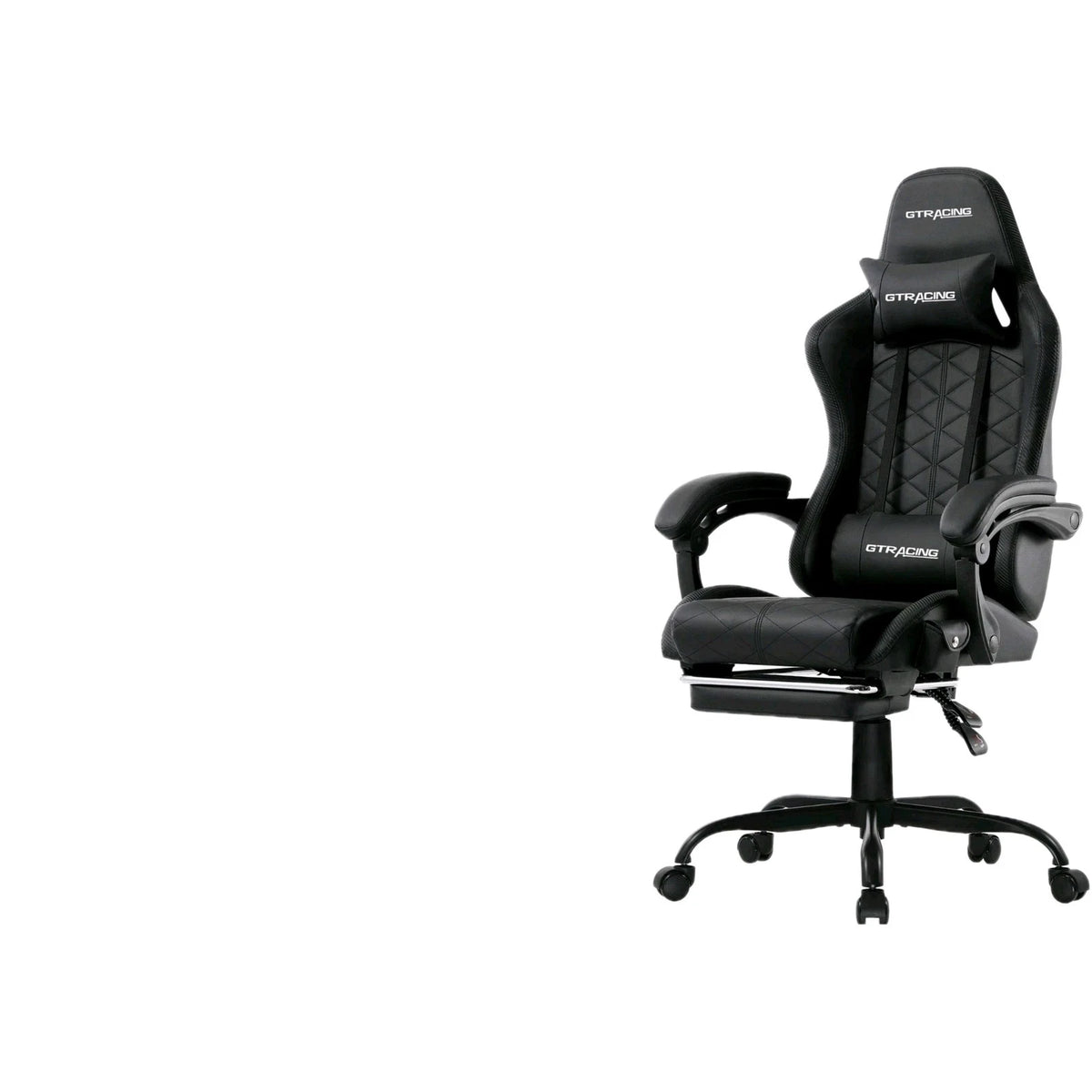 Black gaming chair with footrest extended, shown at an angle on white
