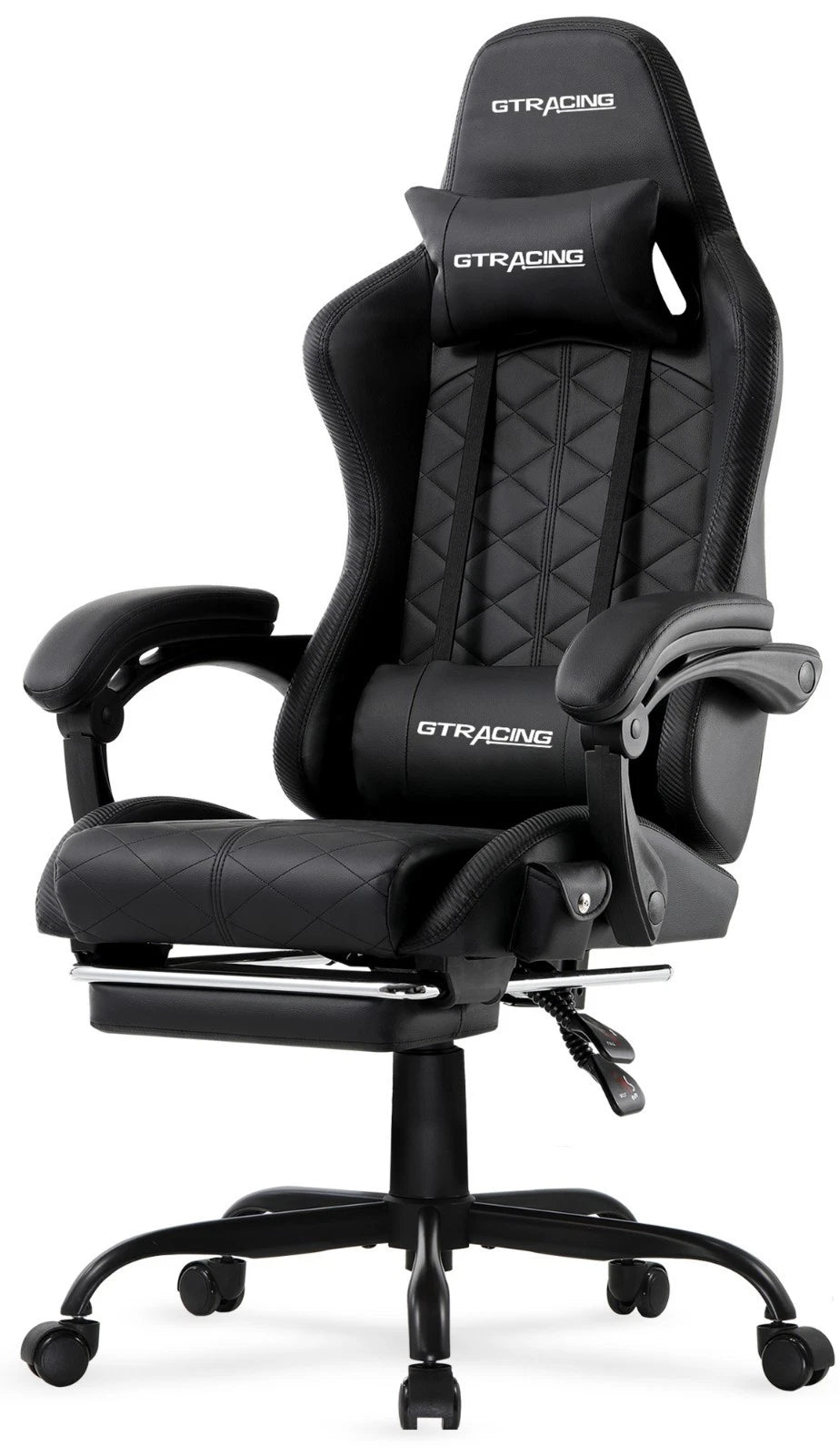 Black gaming chair with diamond stitching, head and lumbar pillows and pull-out footrest