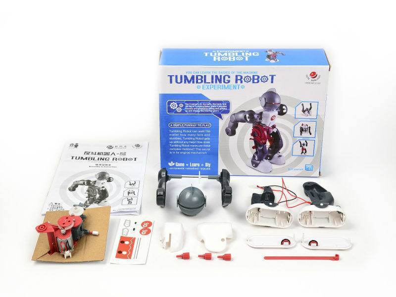 Tumbling Robot Experiment kit laid out: box, instructions, gearbox, battery holders and plastic body parts