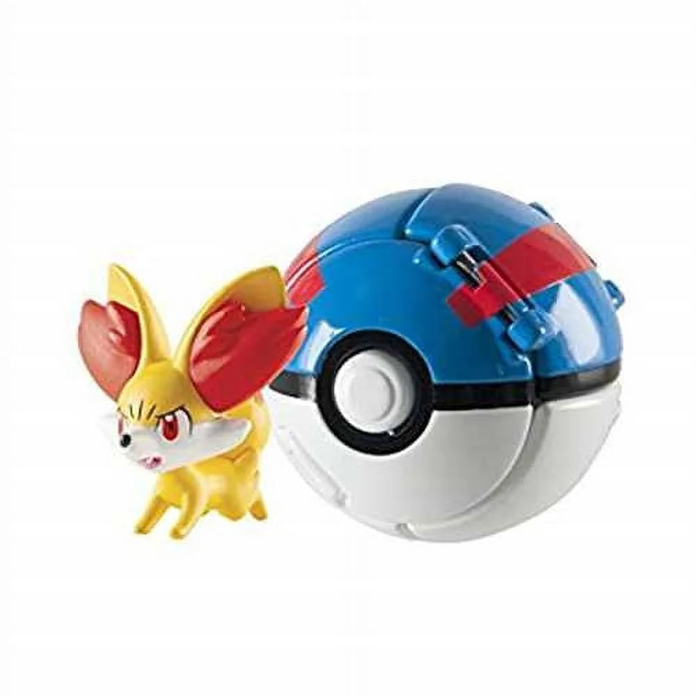 Yellow fox figure with big red-tufted ears beside a blue and white capture ball with red stripes