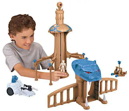 Boy playing with the tower playset and its clear figure
