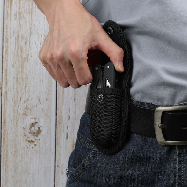 Hand pulling the black multi-tool from its belt sheath