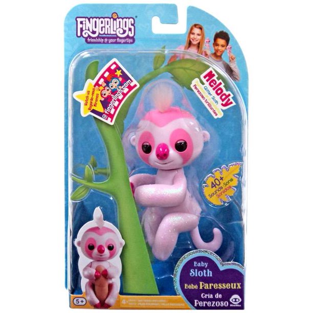 Fingerlings Melody glitter pink baby sloth on a green branch in its package