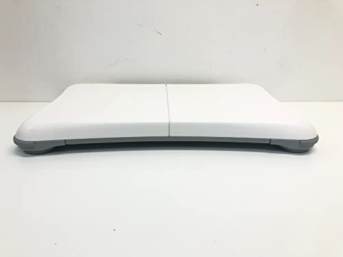 Long side of the white balance board on a table