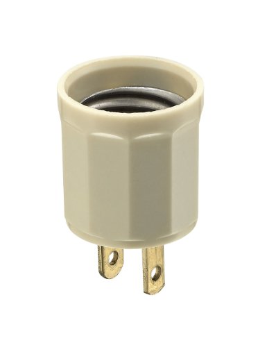Ivory plug-in lamp holder adapter with a medium screw socket