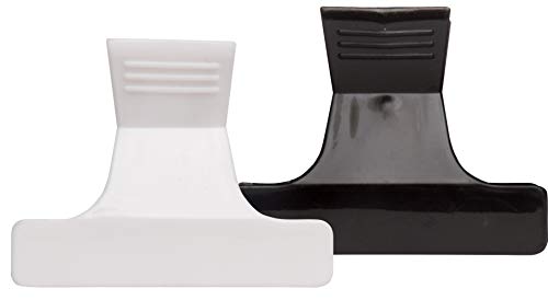 White and black butterfly hair clamps side by side