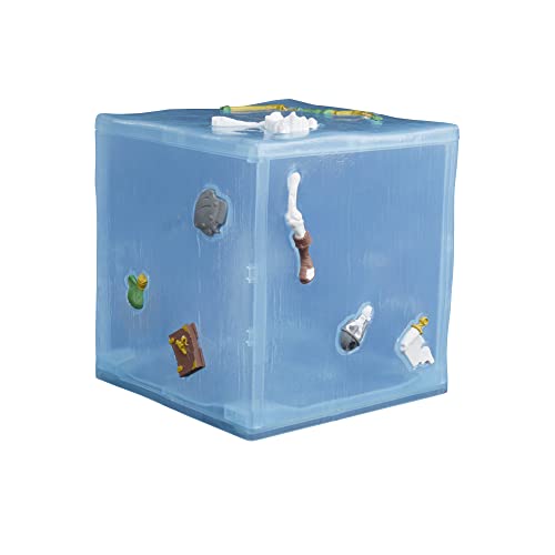 Translucent blue cube figure with bones, a potion and a book stuck to its sides