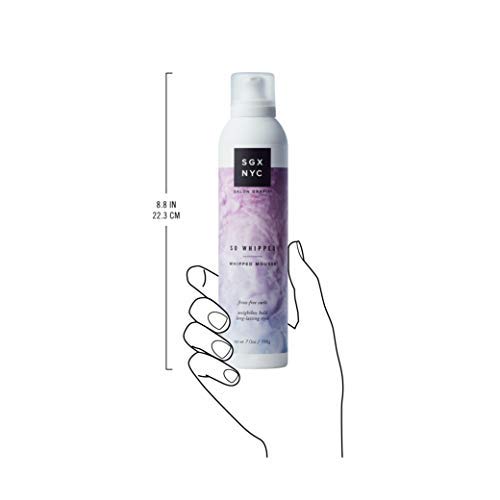 So Whipped mousse can held in an outlined hand, 8.8 inches tall