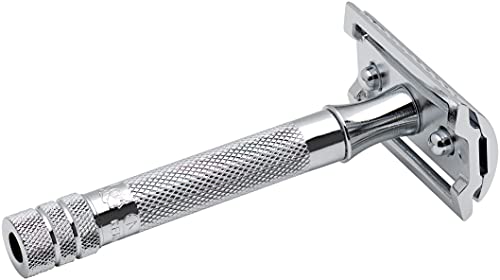 Chrome safety razor lying on its side showing the straight bar guard