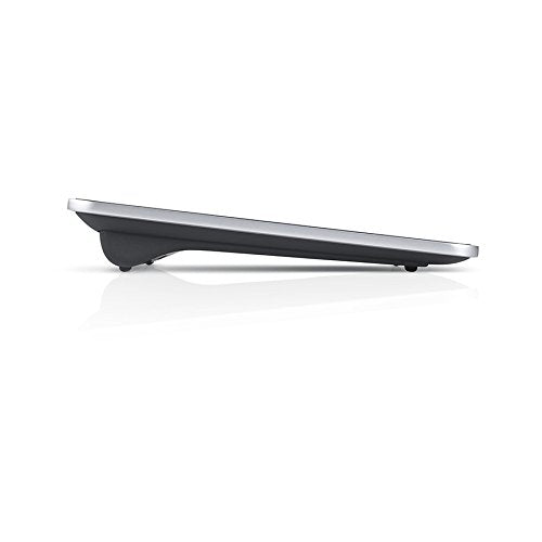 Side profile of the touchpad showing its tilted wedge base