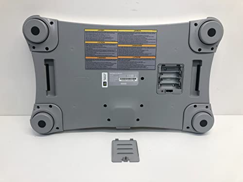 Grey underside of the balance board with four feet and the battery cover off