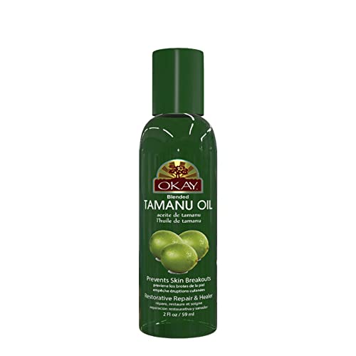 Green 2 oz bottle of blended tamanu oil with tamanu fruit on the label