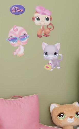Littlest Pet Shop bird, monkey and cat decals on a green wall above a pink pillow