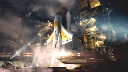 Space shuttle on a launch pad inside a smoky hangar