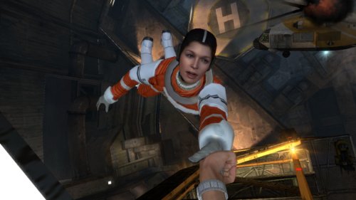 Woman in an orange and white flight suit hanging from a hand over a shaft