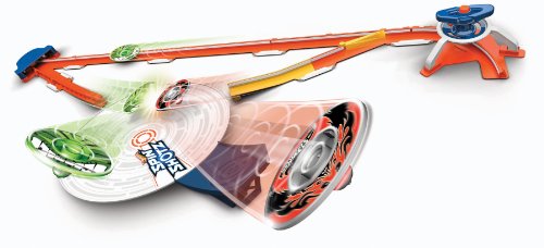 Spinshotz discs racing down the orange track toward the arena, motion illustration