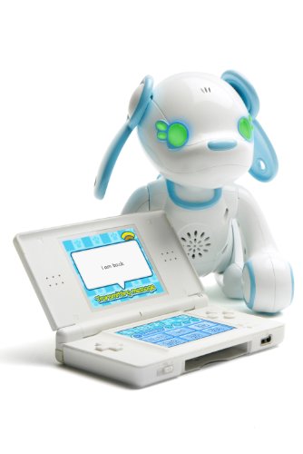 Wappy Dog robot puppy with green eyes sitting behind an open DS Lite