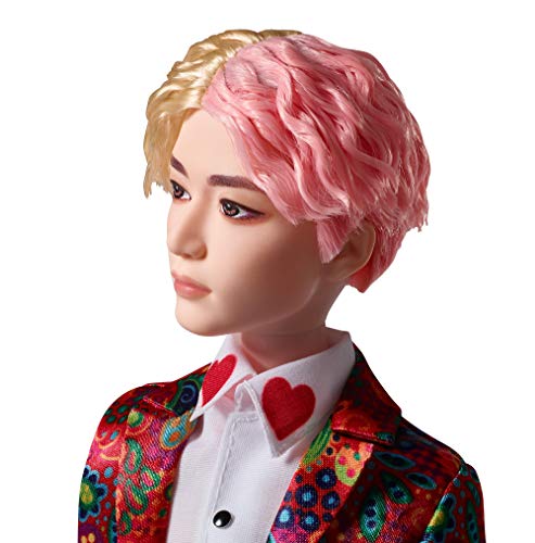 Close-up of the BTS V doll face with two-tone hair and a heart collar, turned left