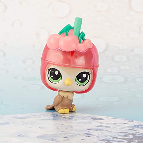 Brown bird figure in a pink cherry slushie cup helmet