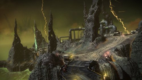 Rocky base with pipes and a winding road under a stormy green sky