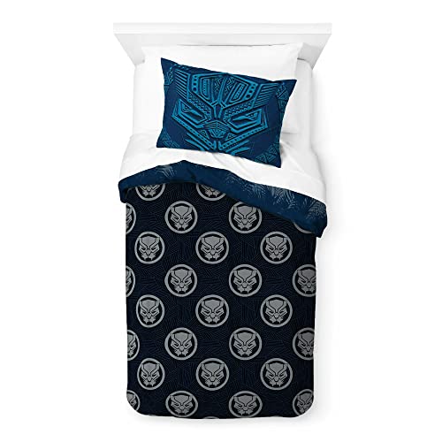 Reverse side of the comforter: navy with rows of grey panther-head emblems