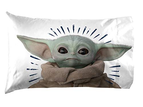 White pillowcase printed with a large Grogu face and navy burst lines
