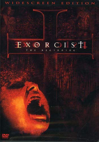 Exorcist: The Beginning widescreen DVD cover, a screaming face under a red cross