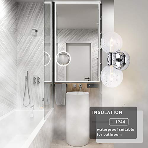 Clear globe sconce beside a bathroom mirror with an IP44 waterproof callout
