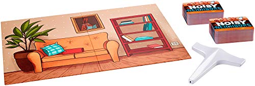 Cardboard apartment wall with a sofa scene, stand and two card decks