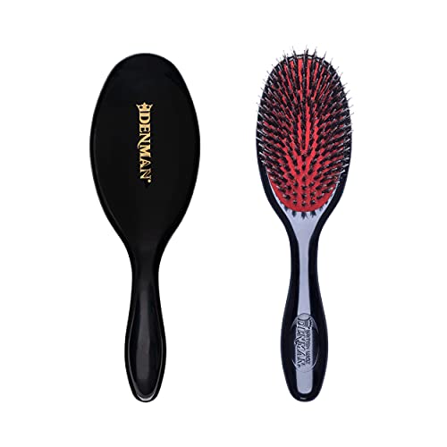 Black oval cushion brush, back with gold lettering and front with red pad