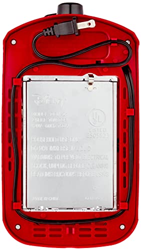 Underside of the red toaster with crumb tray and cord wrap