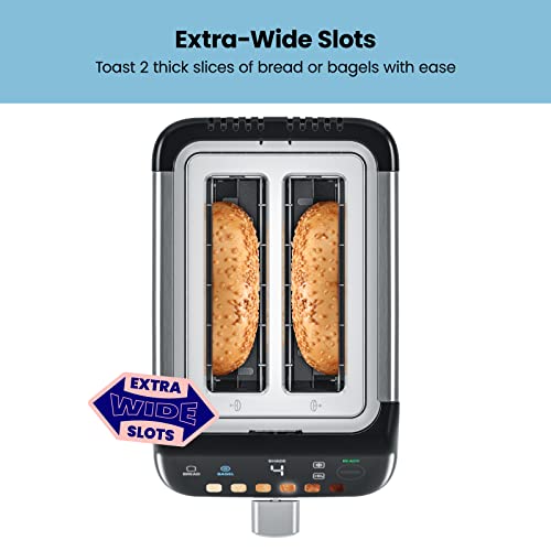 Top-down view of two bagel halves in the extra-wide toaster slots