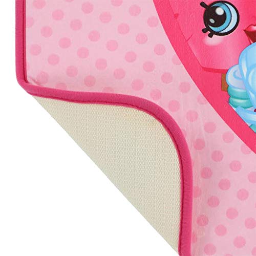 Corner of the Shopkins mat folded back to show its non-slip backing
