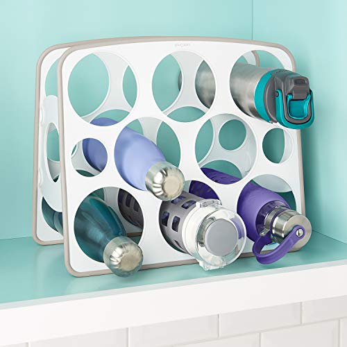 White bottle stand on a cabinet shelf holding water bottles and tumblers sideways