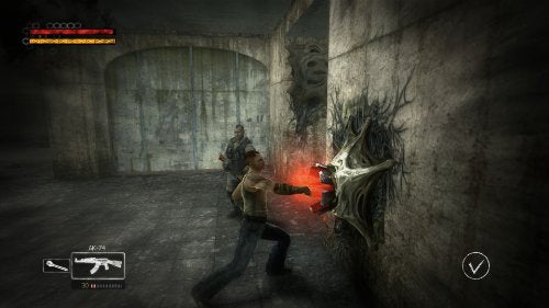 MorphX gameplay: a soldier firing a red energy blast at a creature on a concrete wall