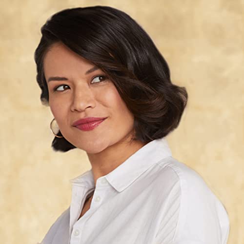 Woman with a voluminous dark bob and red lipstick