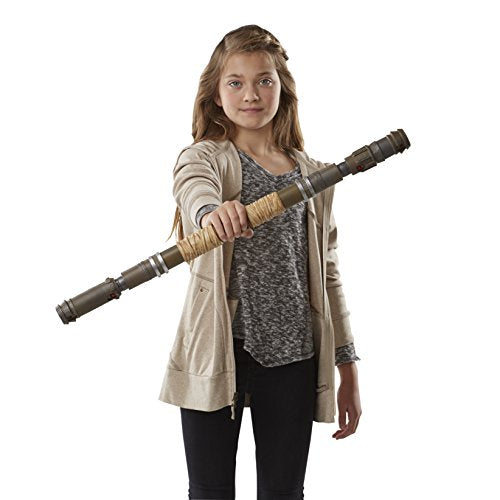 Girl holding Rey's staff out horizontally in front of her